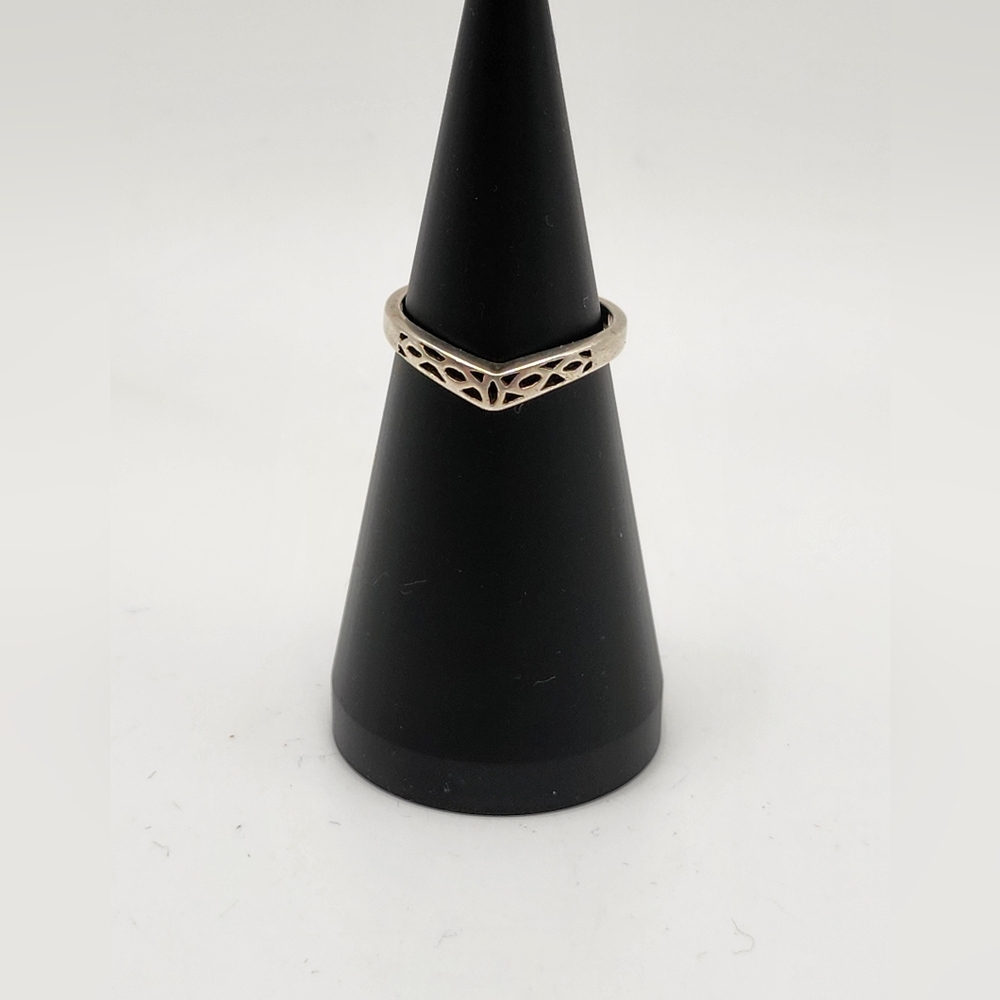 Beautiful sterling silver vintage shaped open work ring.  Size 7.